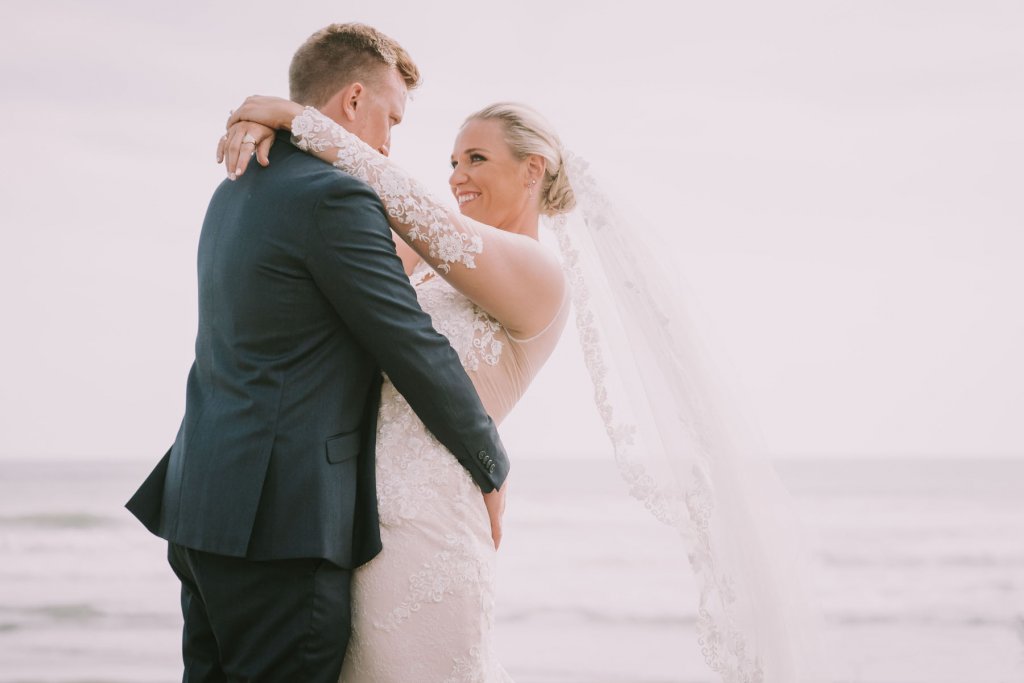 Real Bride Jamielle wearing her Custom Harriett Falvey Wedding Dress and Veil Made in New Zealand